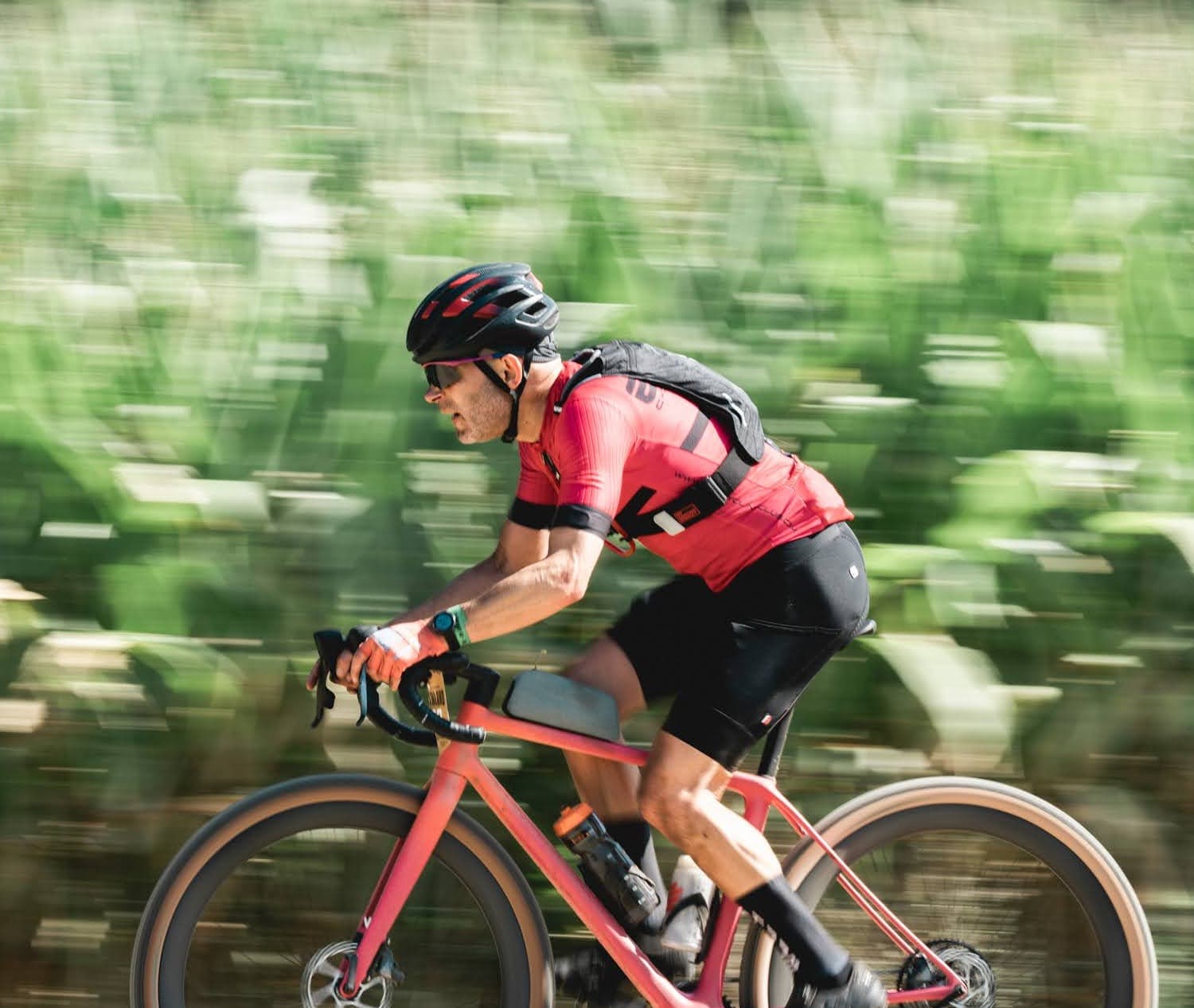 Tom mid-race, motion-blurred forest behind.